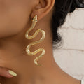 Boucles d'oreilles serpent dorées-style vintage